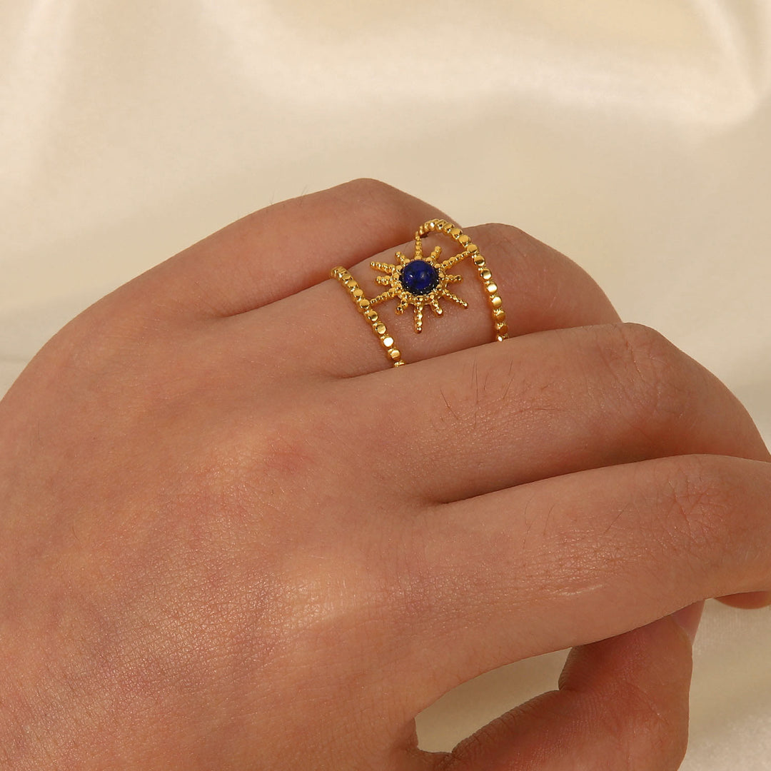 Anillo de gemas con estrella de ocho puntas y doble hilera de girasol de Olivenorma