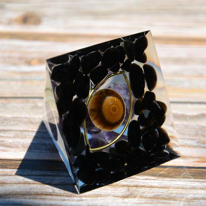 Esfera de amatista de Olivenorma con pirámide de orgón de obsidiana y ojo de tigre