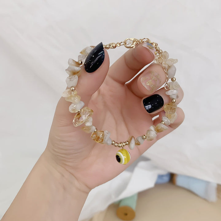 Pulsera con colgante de ojo malvado de grava de cristal natural de Olivenorma