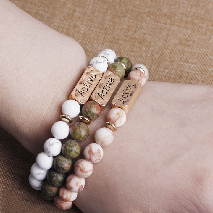 Pulsera con grabado de fe activa con piedras preciosas naturales de Olivenorma