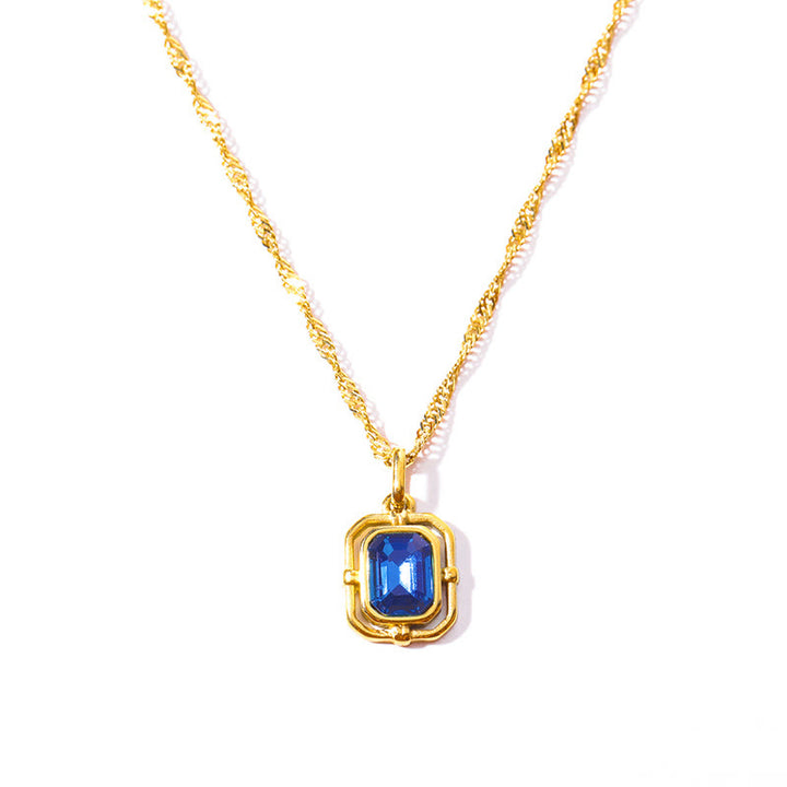 Collar de acero y titanio con circonitas cuadradas y cadena de ondas de agua de Olivenorma 
