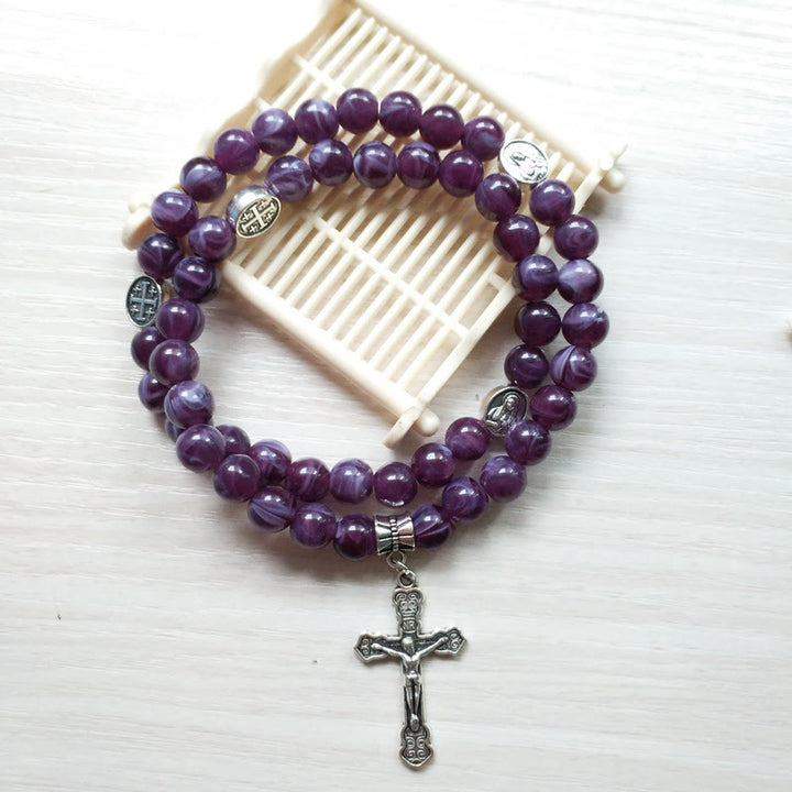 Pulsera rosario con colgante de cruz de amatista de Olivenorma