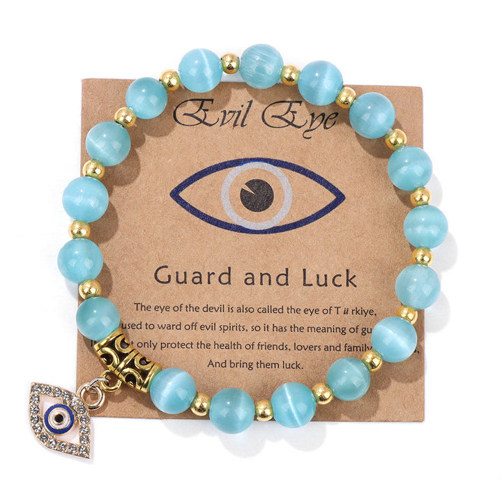 Pulsera con colgante de ojo malvado y cuentas de piedra natural de Olivenorma