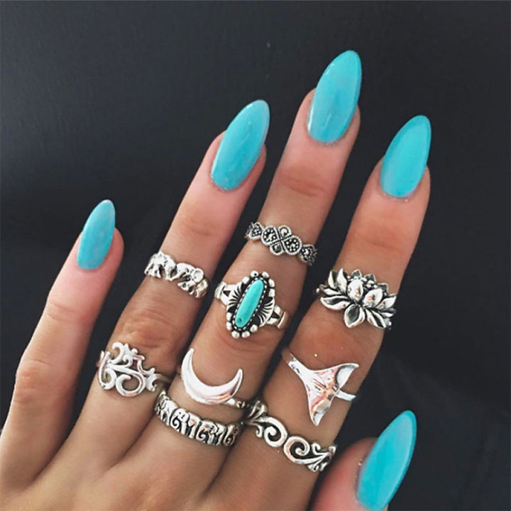 Juego de anillos con símbolo de loto turquesa de Olivenorma
