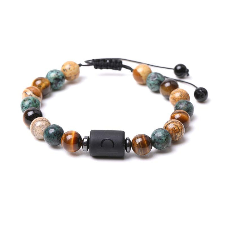 Pulsera con imagen de ojo de tigre y jaspe del zodiaco