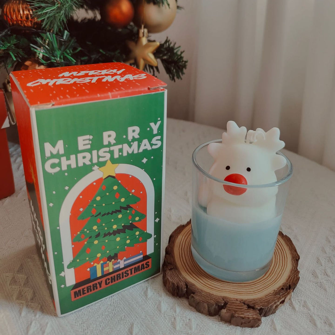 Vela navideña con forma de alce, muñeco de nieve y Papá Noel de Olivenorma 