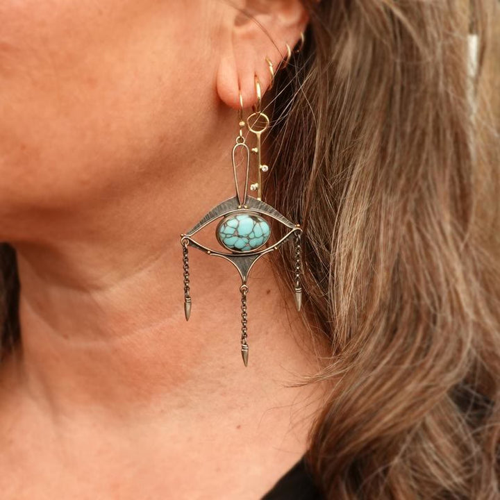 Pendientes bohemios con turquesa y ojo recortado geométrico de Olivenorma
