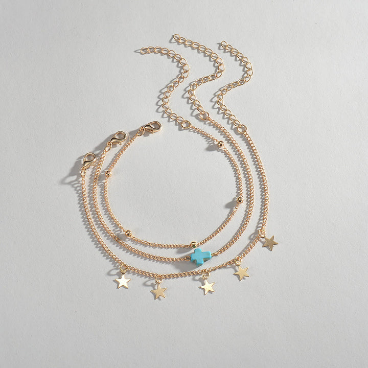Tobillero multicapa con borlas y estrellas cruzadas para mujer de Olivenorma Beach