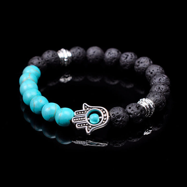 Pulsera con colgante de Hamsa y cuentas de piedra natural hecha a mano de Olivenorma