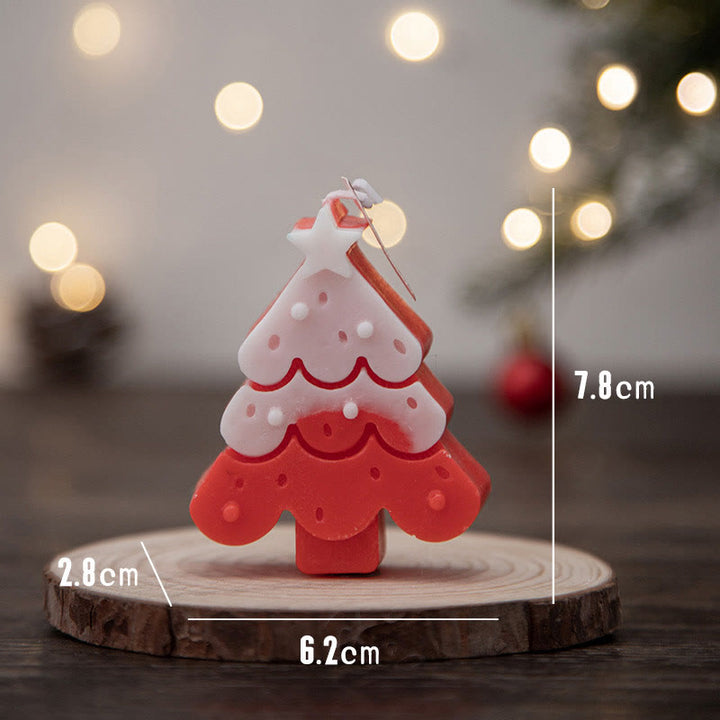 Vela perfumada con forma de hombrecito de jengibre y copos de nieve con atmósfera navideña de Olivenorma 