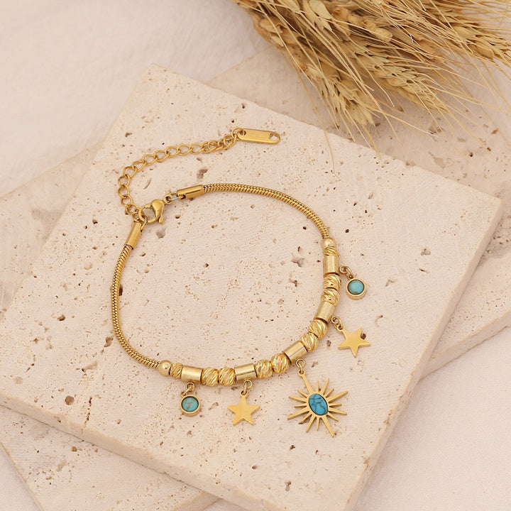 Collar, pulsera y pendientes con colgante de estrella y sol turquesa de Olivenorma