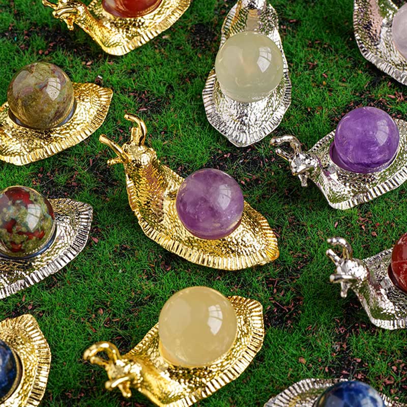 Soporte para bolas de cristal natural de Olivenorma, pequeño caracol decorativo con piedras preciosas