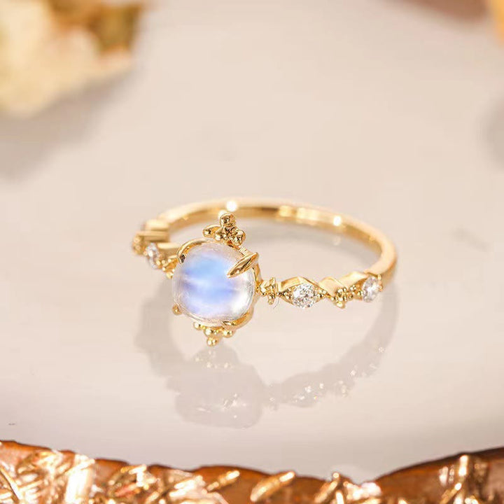 Anillo ajustable sencillo de lujo con circonita blanca y piedra lunar de Olivenorma 