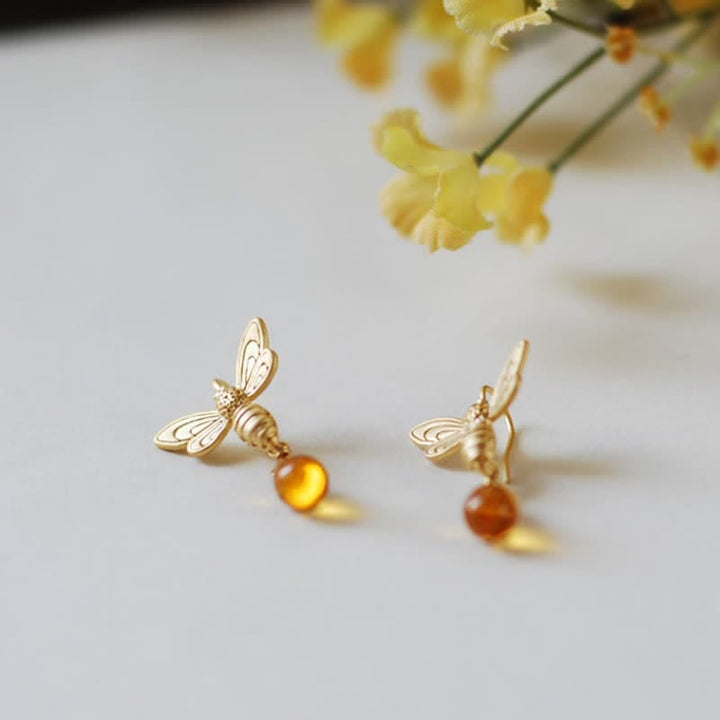 Pendientes y collar con gotas de miel de topacio y ámbar de Olivenorma
