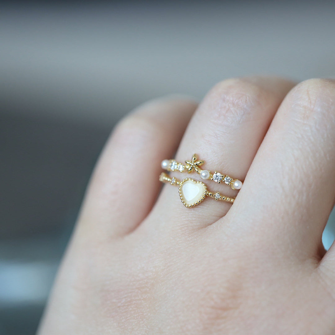 Anillo ajustable con piedra de ojo de gato y circonita blanca de Olivenorma 