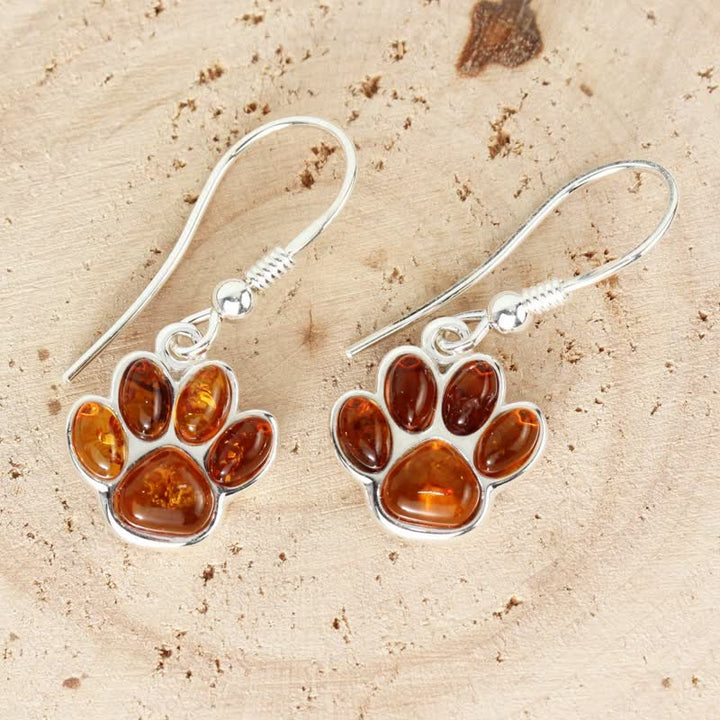 Pendientes colgantes de ámbar con huella de pata de perro