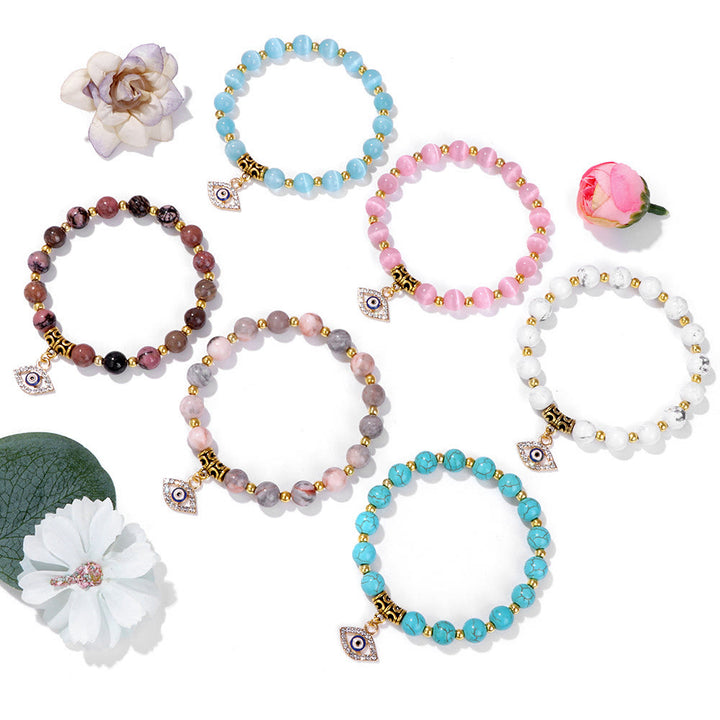 Pulsera con colgante de ojo malvado y cuentas de piedra natural de Olivenorma