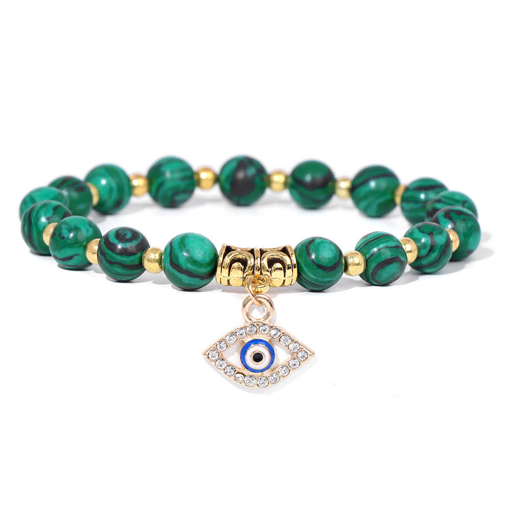 Pulsera con colgante de ojo malvado y cuentas de piedra natural de Olivenorma