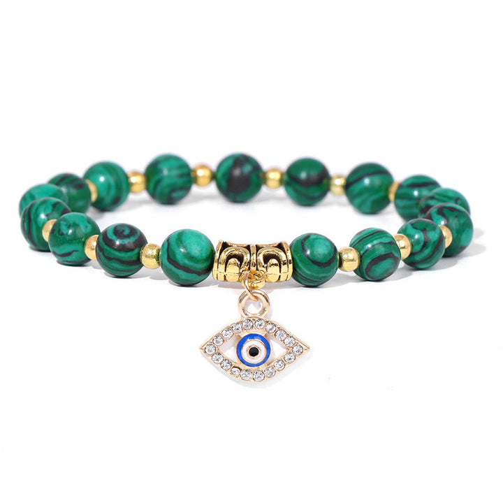 Pulsera con colgante de ojo malvado y cuentas de piedra natural de Olivenorma