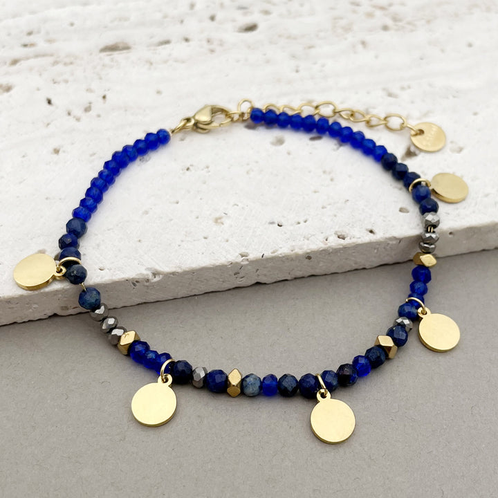 Pulsera con dijes de disco de titanio y cuentas de piedra natural de Olivenorma