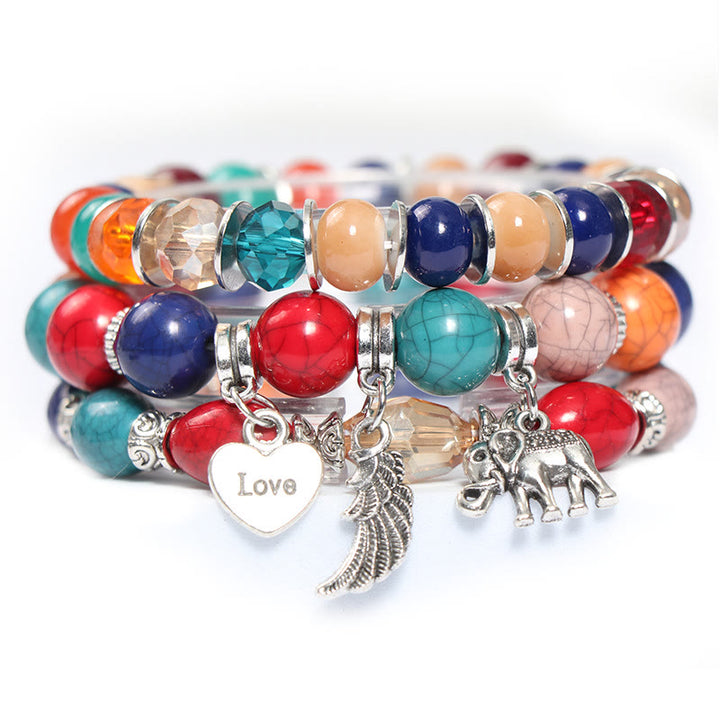 Juego de pulseras con cuentas y colgante de corazón con alas de elefante de Olivenorma 