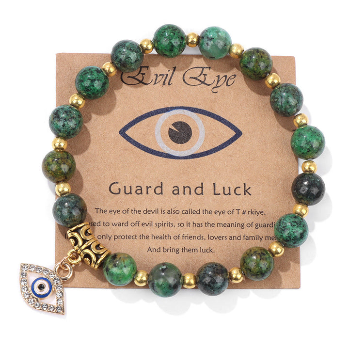 Pulsera con colgante de ojo malvado y cuentas de piedra natural de Olivenorma