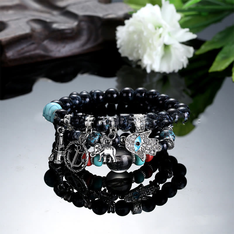 Juego de pulseras de hamsa con ojo malvado y torre de elefante de Olivenorma