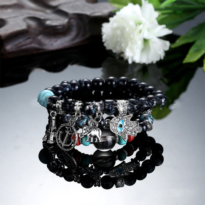 Juego de pulseras de hamsa con ojo malvado y torre de elefante de Olivenorma