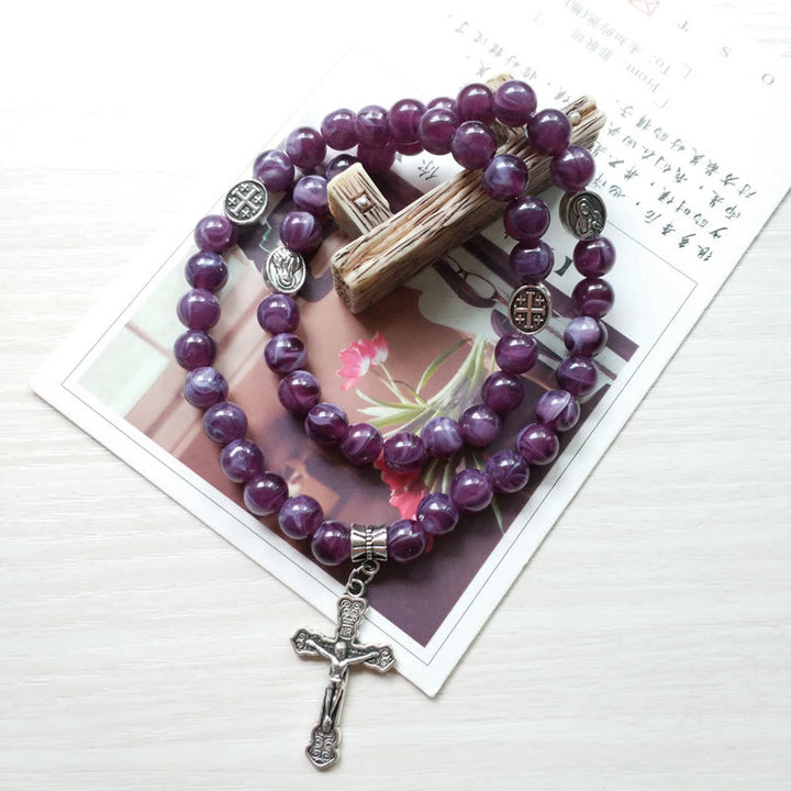 Pulsera rosario con colgante de cruz de amatista de Olivenorma