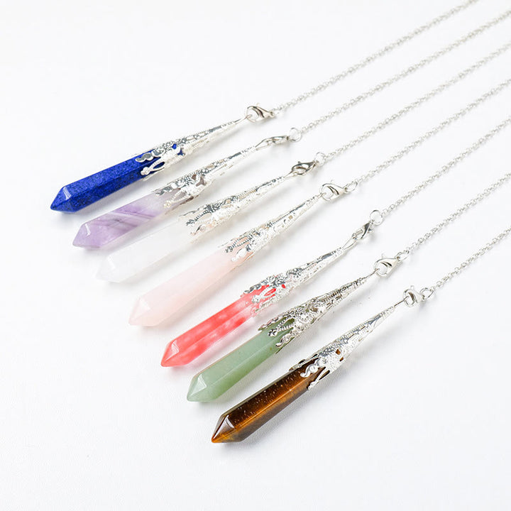 Péndulo de cadena de cobre y plata dorada con cristal natural de Olivenorma 