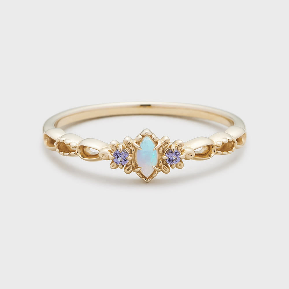 Collar, pendientes y anillo de encaje violeta con ópalo natural de Olivenorma