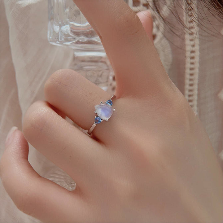 Anillo de plata de ley S925 con topacio azul y piedra lunar de Olivenorma