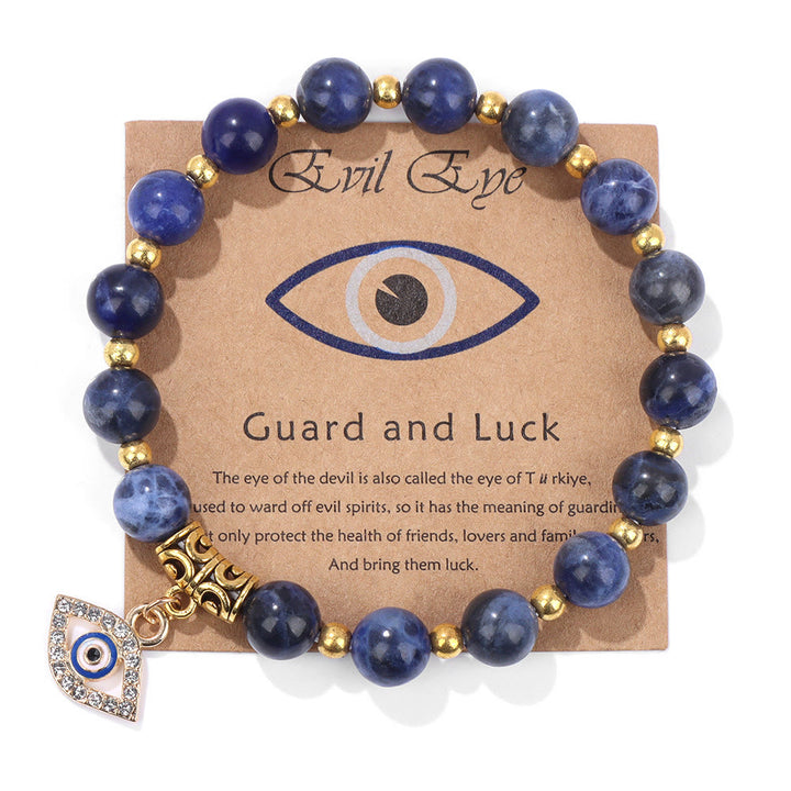 Pulsera con colgante de ojo malvado y cuentas de piedra natural de Olivenorma