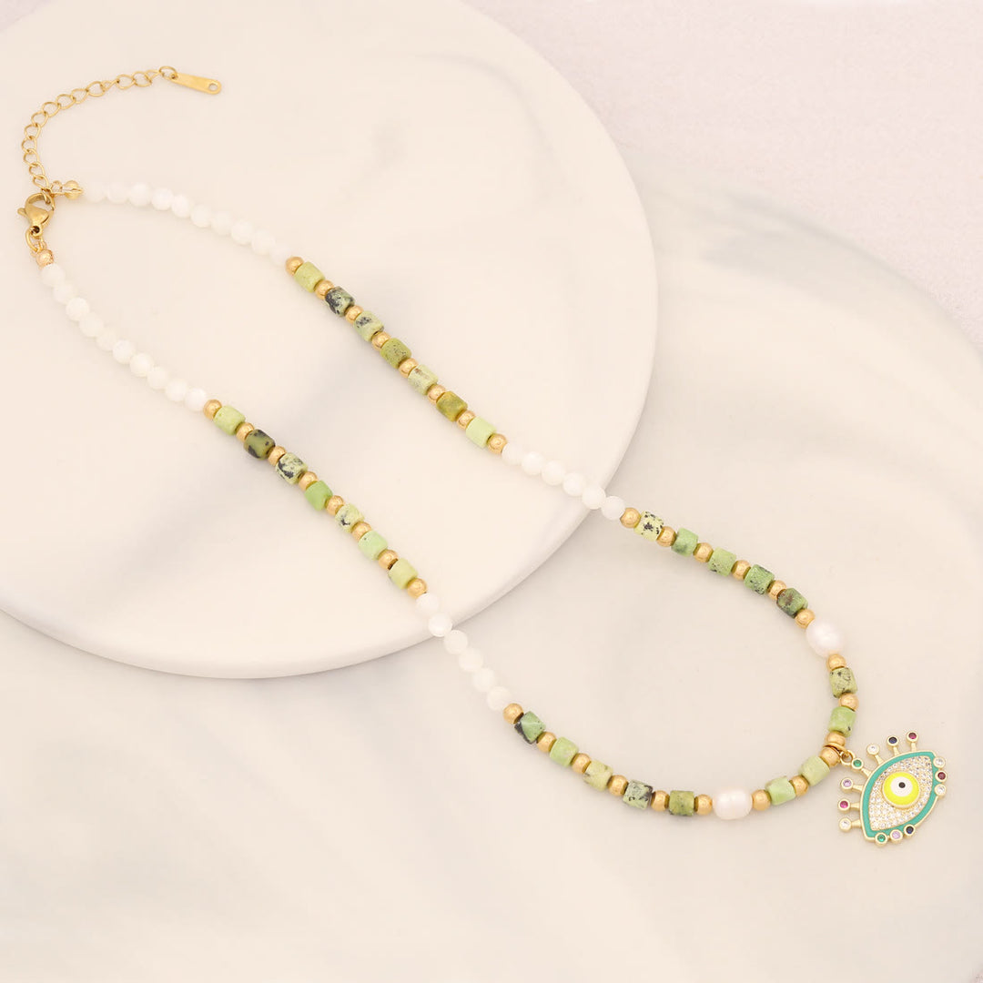 Collar con colgante de ojo malvado con piedra de cristal y perla natural de Olivenorma