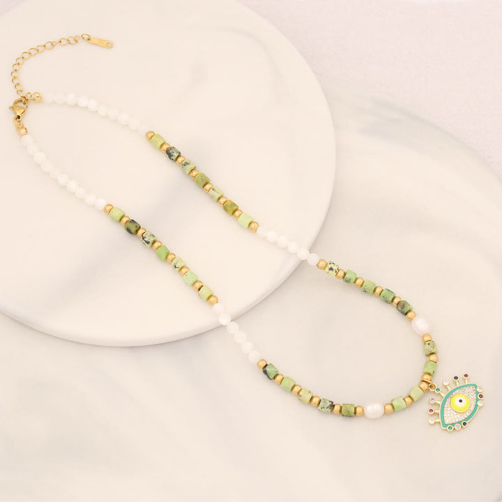 Collar con colgante de ojo malvado con piedra de cristal y perla natural de Olivenorma