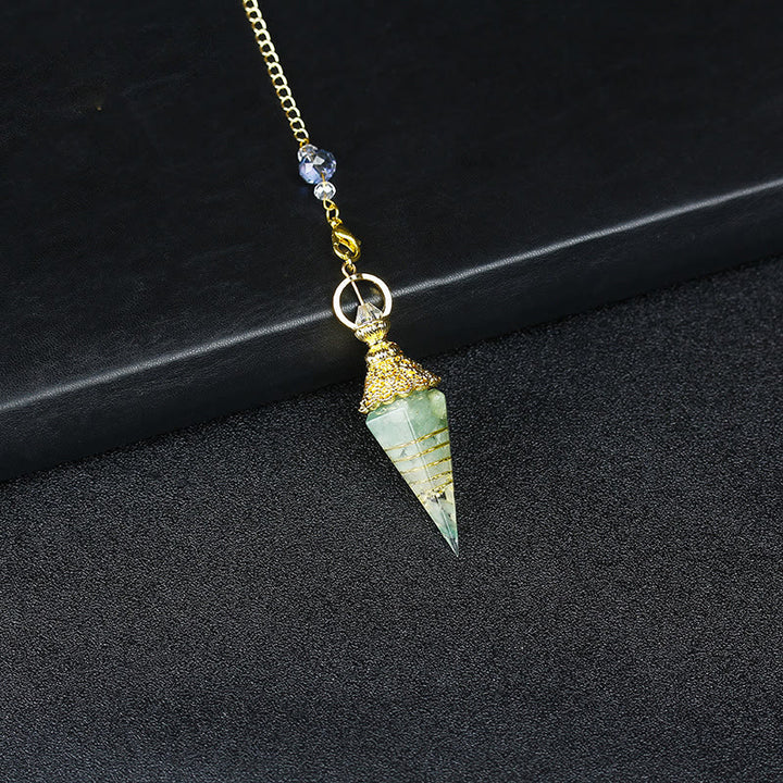 Péndulo piramidal hexagonal de resina de cristal natural de Olivenorma 