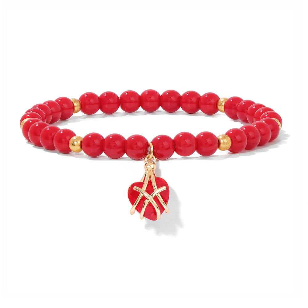 Pulsera con dije de corazón de piedra natural de Olivenorma