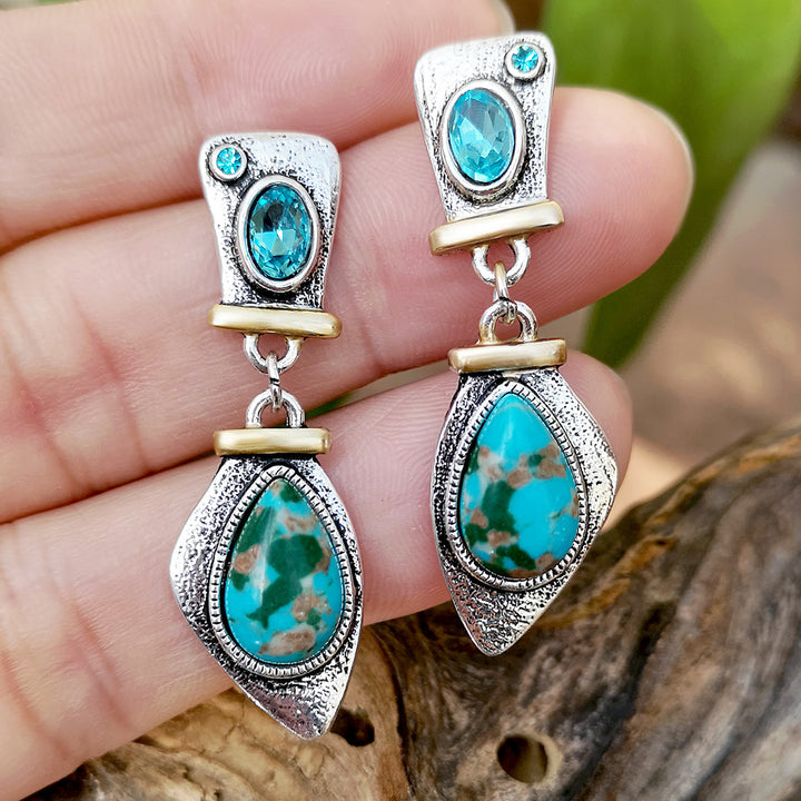 Pendientes de plata con topacio azul y piedra emperadora de Olivenorma