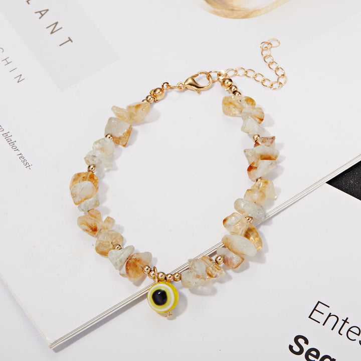 Pulsera con colgante de ojo malvado de grava de cristal natural de Olivenorma