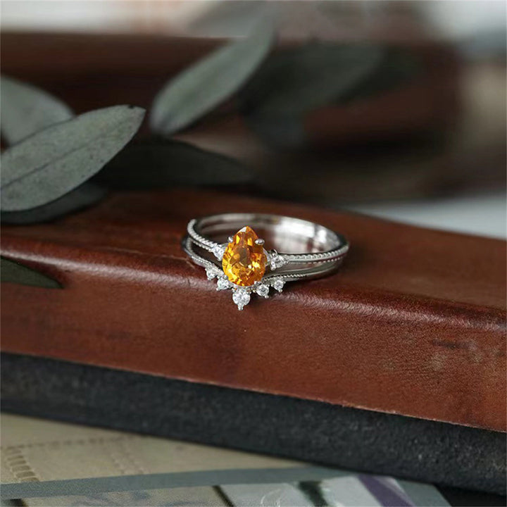 Anillo de citrino en forma de gota de oro y plata 925 de Olivenorma