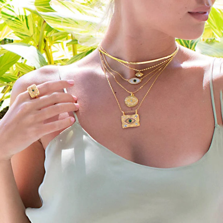 Collar con colgante de amuleto de mal de ojo de cristal natural de Olivenorma