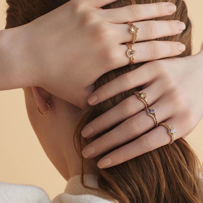 Juego de anillos ajustables apilables con cristales de color rosa peridoto delicado de Olivenorma 