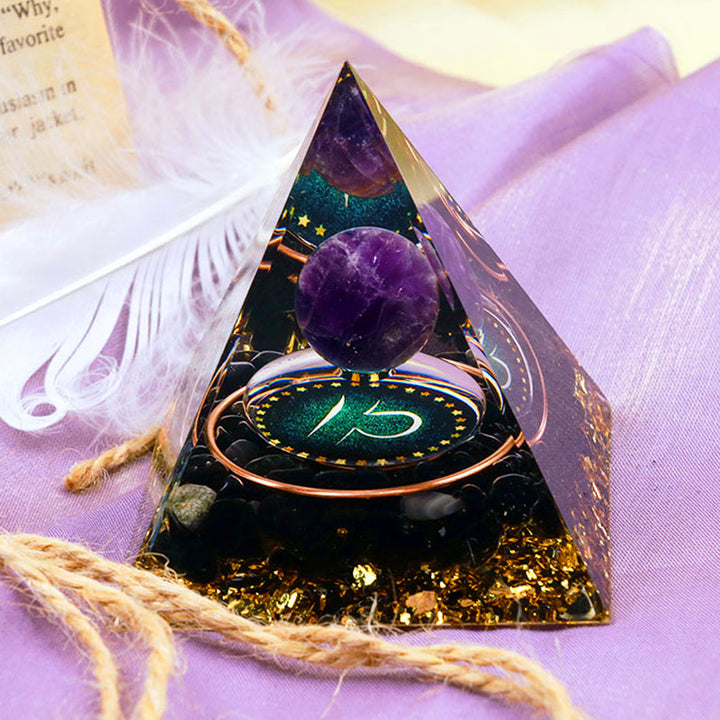 Pirámide de orgón del zodiaco Libra con esfera de amatista y obsidiana de Olivenorma 