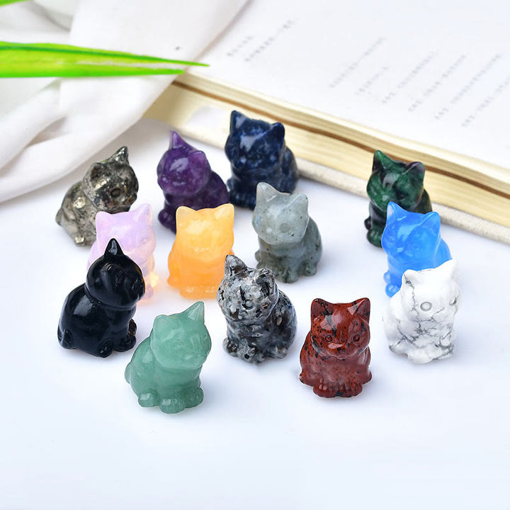 Artesanías con talladas de piedras preciosas y gatitos de cristal de Olivenorma.