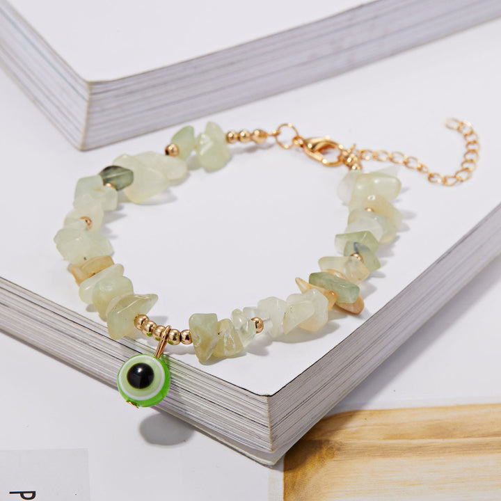 Pulsera con colgante de ojo malvado de grava de cristal natural de Olivenorma