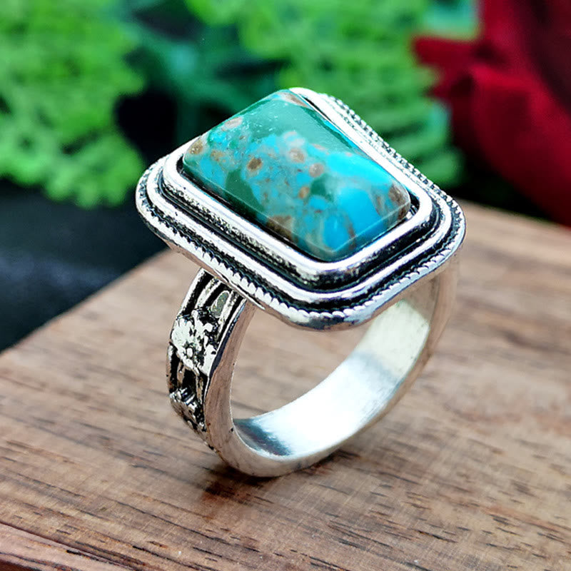 Anillo de plata con rosa en relieve bañado en piedra del emperador Olivenorma 