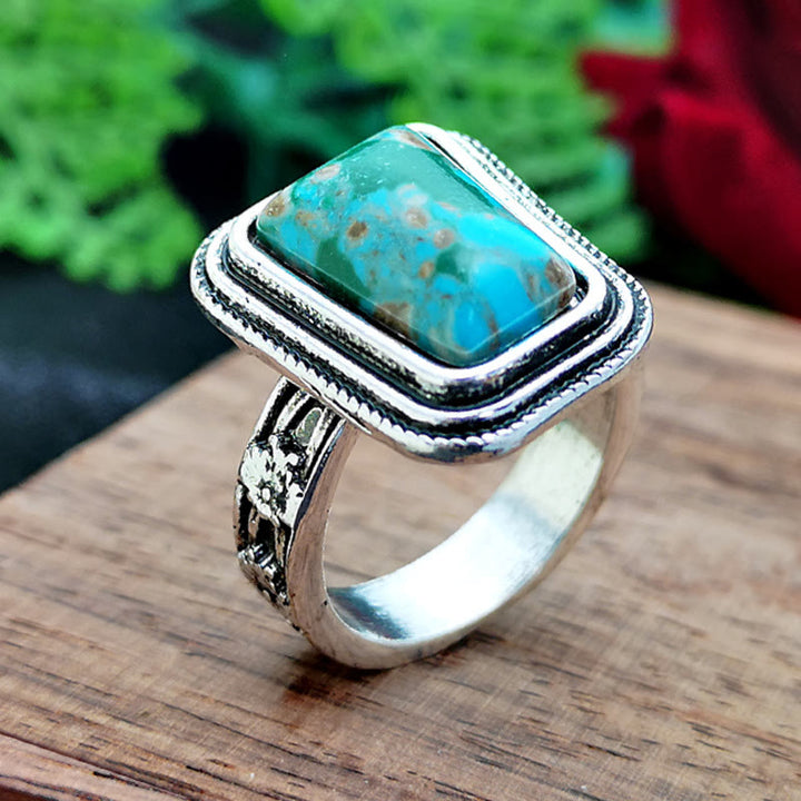 Anillo de plata con rosa en relieve bañado en piedra del emperador Olivenorma 