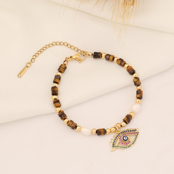 Pulsera de cobre con perlas de agua dulce y piedra natural de Olivenorma 