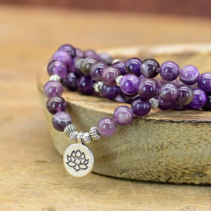 Collar y pulsera con símbolo de loto y amatista de Olivenorma 