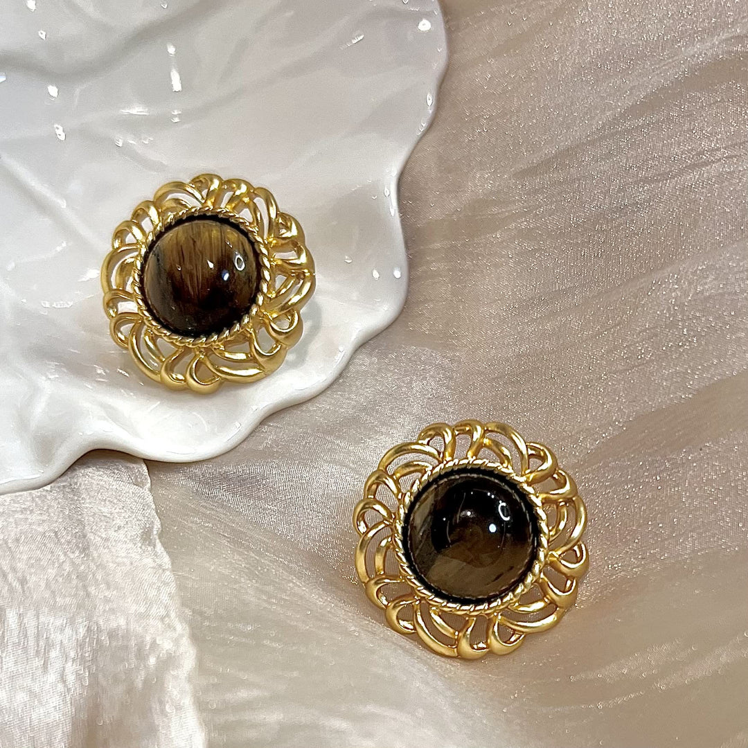 Pendientes de oro con girasol y ojo de tigre de Olivenorma
